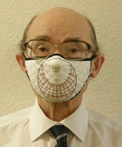 A portable stereographic sundial printed on a face mask